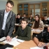 Счастливый человек, молодой педагог Александр Смирнов во время урока в 5-й средней школе. 